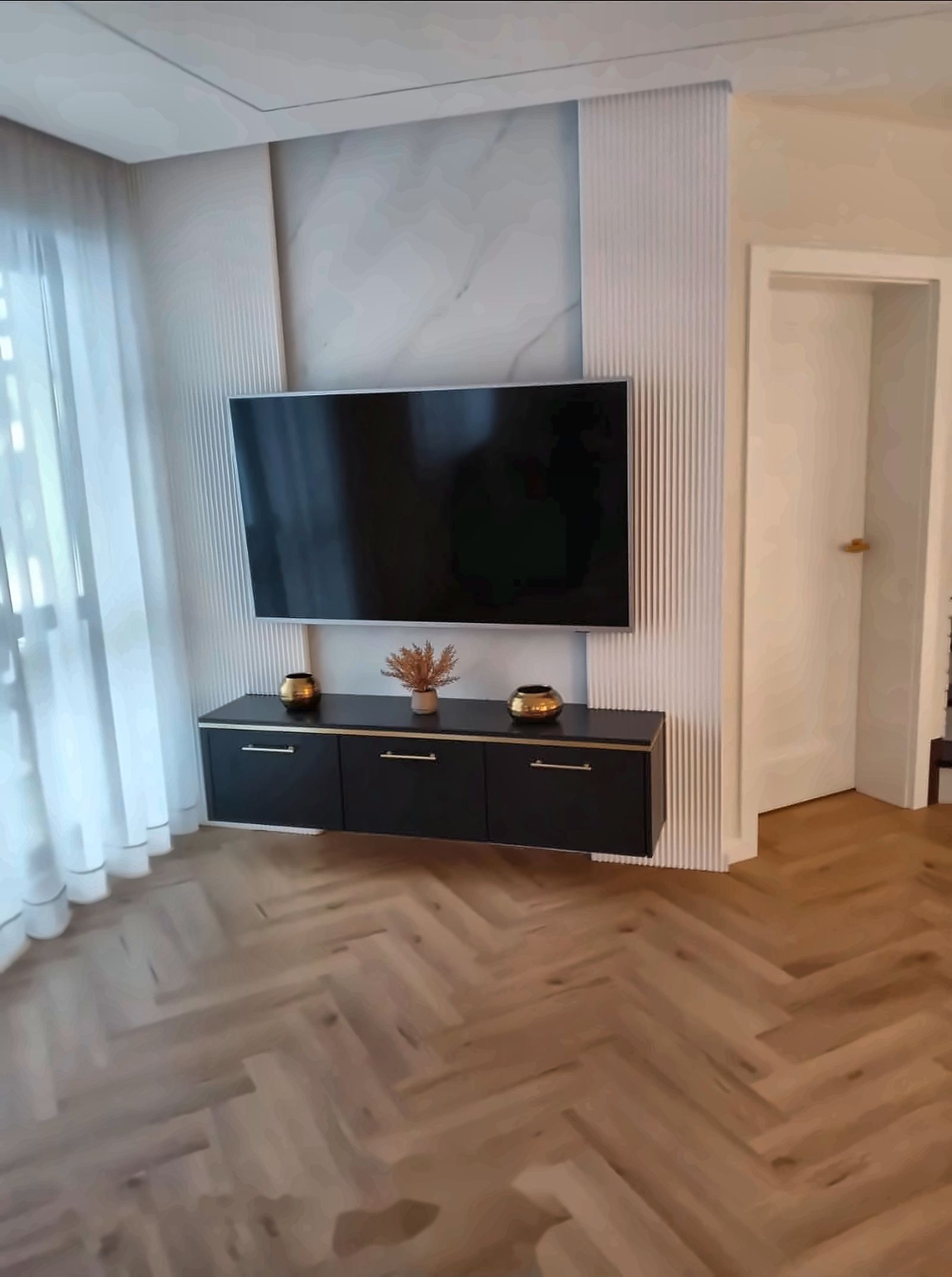 Zabudowa RTV na wymiar — realizacja stolarska Meble Ulan